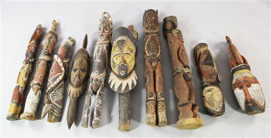 Ten Sepik River ancestor heads, figural house posts, etc.